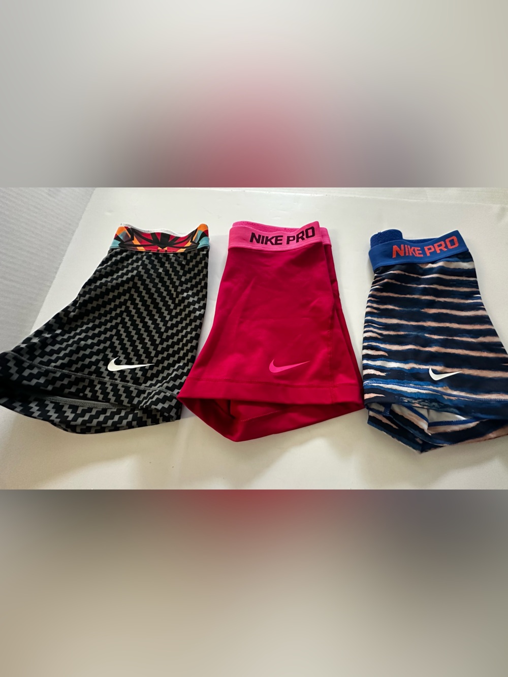 Nike Women's Athletic Shorts Trio - Pink, Black Pattern & Blue Stripe